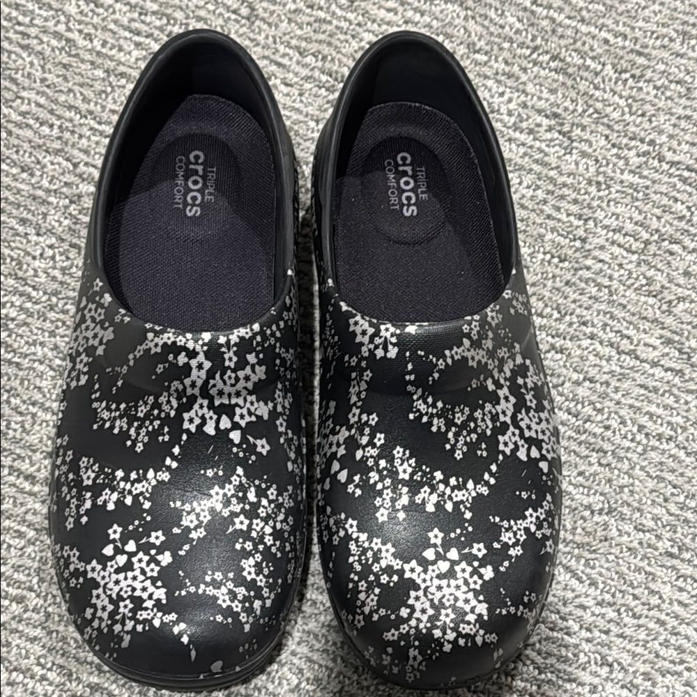 CROCS Black and White Slippers with Floral Design